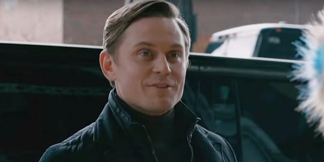 Billy Magnussen smirking as Rod in Elsbeth Season 2