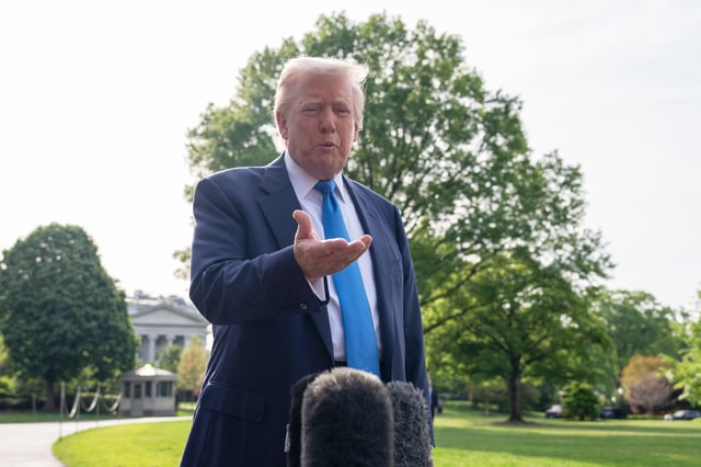 President Donald Trump speaks with reporters as he and first lady Melania Trump depart on Marine One from the South Lawn of the White House, Friday, April 25, 2025, in Washington. The President and first lady will be traveling to Rome and the Vatican to attend the funeral for Pope Francis. (AP Photo/Alex Brandon)