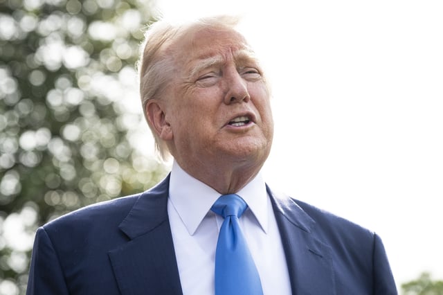President Donald Trump speaks to media while departing the White House to travel to Rome, at the White House, in Washington, D.C., on Friday, April 25, 2025.
