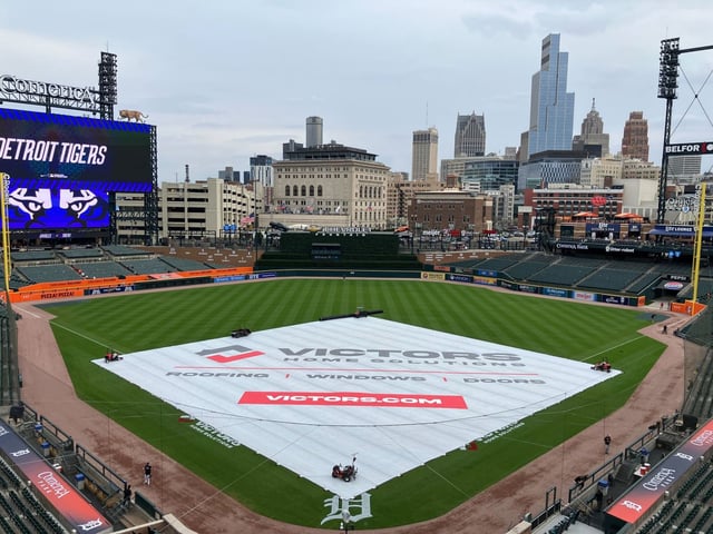 The tarp is placed on the field at Comerica Park in Detroit ahead of a postponed game Friday between the Orioles and Tigers. (Jacob Calvin Meyer/Staff)