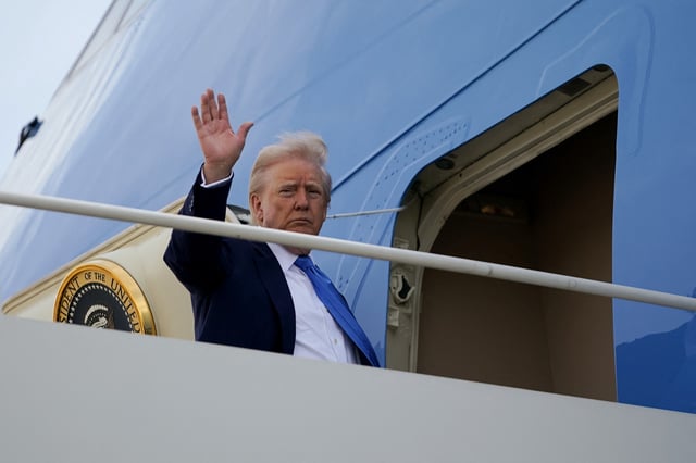 U.S. President Donald Trump boards Air Force One as he departs for Rome, Italy, to attend Pope Francis' funeral, at Joint Base Andrews in Maryland, U.S., April 25, 2025. REUTERS/Nathan Howard