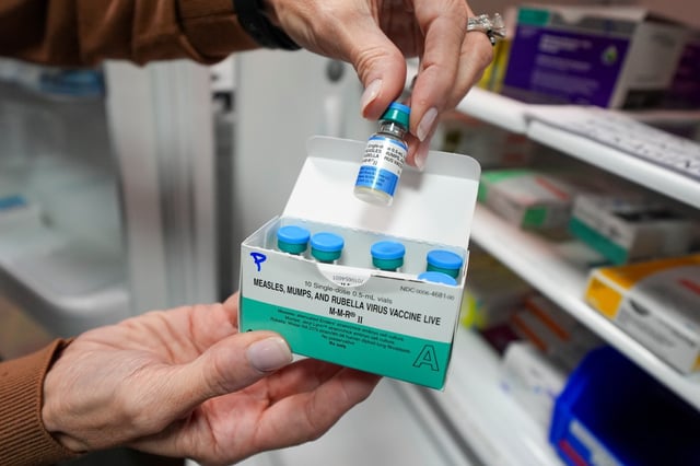 Vials of the MMR measles, mumps and rubella virus vaccine are displayed Tuesday, Feb. 25, 2025, in Lubbock, Texas. (AP Photo/Julio Cortez)