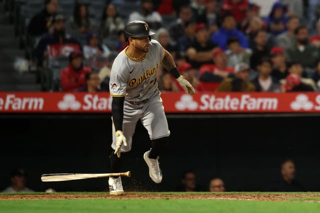 Apr 23, 2025; Anaheim, California, USA;  Pittsburgh Pirates left fielder Tommy Pham (28) hits an RBI single during the ninth inning against the Los Angeles Angels at Angel Stadium. Mandatory Credit: Kiyoshi Mio-Imagn Images/File photo