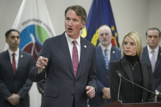 Virginia Gov. Glenn Youngkin speaks as Attorney General Pam Bondi, right, listens during a news conference about an MS-13 gang leader who was arrested in an operation by the Virginia Homeland Security Task Force, during a news conference at the Manassas FBI Field Office, Thursday, March 27, 2025, in Manassas, Va. (AP Photo/Rod Lamkey, Jr.)