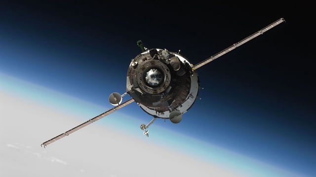 The Soyuz TMA-16 spacecraft approaches the International Space Station, carrying NASA astronaut Jeffrey Williams, Expedition 21 flight engineer; Russian cosmonaut Maxim Suraev, Soyuz commander and flight engineer; and spaceflight participant Guy Laliberte.