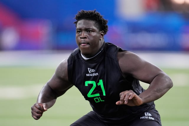 LSU offensive lineman Emery Jones Jr. runs a drill at the NFL football scouting combine in Indianapolis, Sunday, March 2, 2025. (AP Photo/George Walker IV)