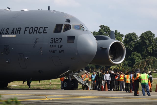 U.S. Air force flight can be seen carrying deported migrants by the U.S. government arriving at Ramon Villeda Morales International Airport on January 31, 2025, in San Pedro Sula, Honduras. (Photo by Jorge Salvador Cabrera/Getty Images)