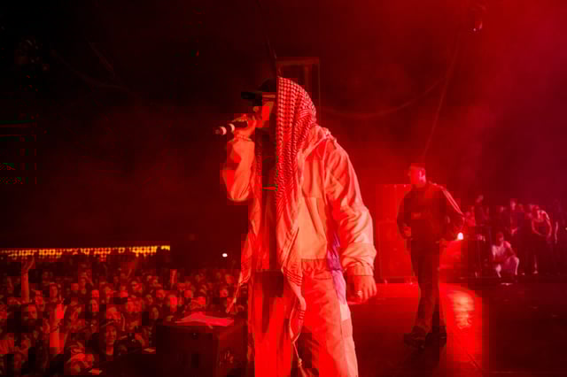 Members of the band Kneecap perform onstage during Day 1 of Coachella Valley Music and Arts Festival on April 18, 2025, in Indio, Calif.