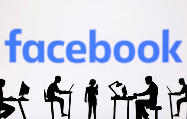 Figurines with computers and smartphones are seen in front of Facebook logo in this illustration taken, February 19, 2024. REUTERS/Dado Ruvic/Illustration/File Photo