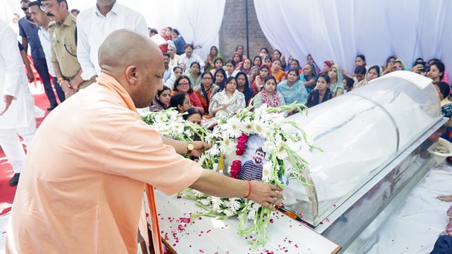 Uttar Pradesh Chief Minister Yogi Adityanath lays a wreath on the mortal remains of Shubham Dwivedi, who was shot dead in the Pahalgam terror attack, in Kanpur on Thursday.