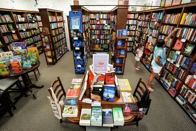 Natasha and Ava Bjoerndal shop at Blue Willow Bookshop on Friday, May 26, 2023 in Houston. 