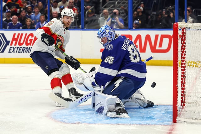 Sam Bennett #9 of the Florida Panthers scores past Andrei Vasilevskiy #88 of the Tampa Bay Lightning in the first period of Game One of the First Round of the 2025 Stanley Cup Playoffs at the Amalie Arena on April 22, 2025 in Tampa, Florida.