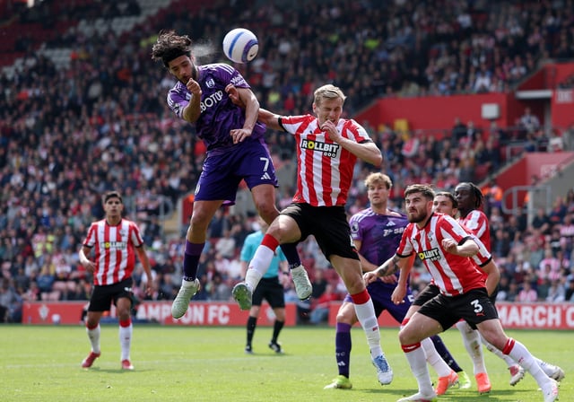 Soccer Football - Premier League - Southampton v Fulham - St Mary's Stadium, Southampton, Britain - April 26, 2025 Fulham's Raul Jimenez in action with Southampton's Flynn Downes Action Images via Reuters/John Sibley