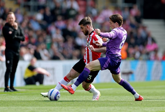 Soccer Football - Premier League - Southampton v Fulham - St Mary's Stadium, Southampton, Britain - April 26, 2025 Southampton's Ryan Manning in action with Fulham's Harry Wilson Action Images via Reuters/John Sibley