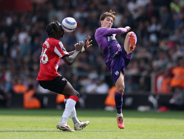 Soccer Football - Premier League - Southampton v Fulham - St Mary's Stadium, Southampton, Britain - April 26, 2025 Fulham's Harry Wilson in action with Southampton's Lesley Ugochukwu Action Images via Reuters/John Sibley