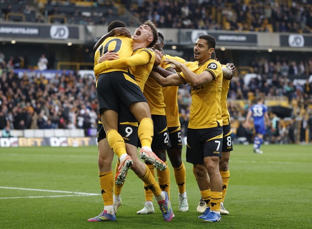 Soccer Football - Premier League - Wolverhampton Wanderers v Leicester City - Molineux Stadium, Wolverhampton, Britain - April 26, 2025 Wolverhampton Wanderers' Jorgen Strand Larsen celebrates with teammates after scoring their second goal Action Images via Reuters/Jason Cairnduff