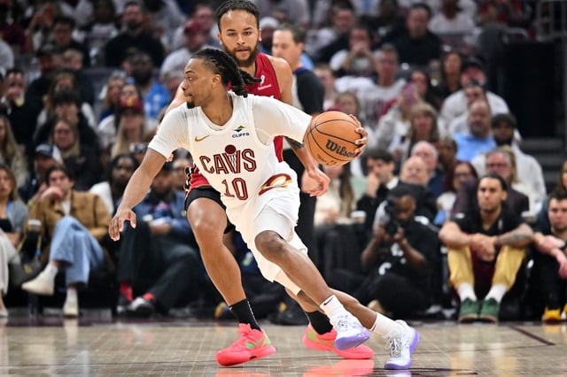 Darius Garland #10 of the Cleveland Cavaliers drives to the basket around Kyle Anderson #20 of the Miami Heat during the second quarter of game one of the first round of the Eastern Conference Playoffs at Rocket Arena on April 20, 2025 in Cleveland, Ohio.