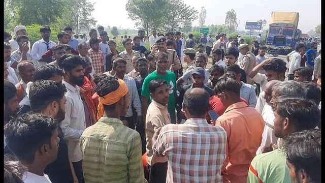 Villagers protesting after three workers were killed in the blast at an illegal firecracker factory in Deoband. (HT photo)