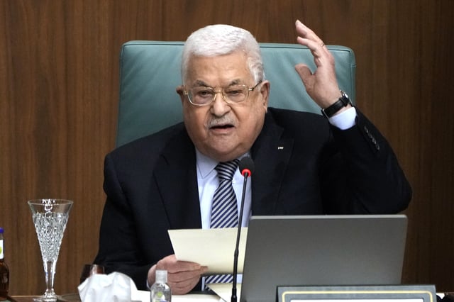 FILE - Palestinian President Mahmoud Abbas speaks during a conference at the Arab League headquarters in Cairo, Feb. 12, 2023. (AP Photo/Amr Nabil, File)