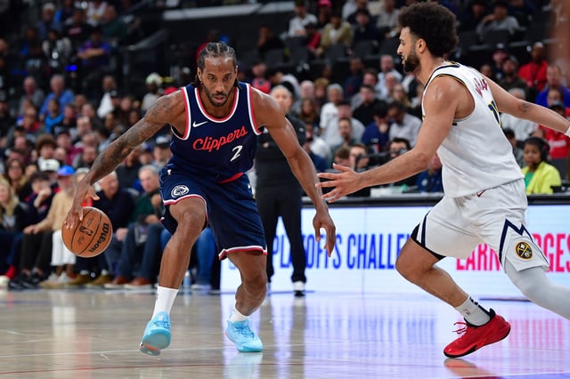 Los Angeles Clippers forward Kawhi Leonard (2) moves the ball against Denver Nuggets guard Jamal Murray (27) during the second half of game three in the first round for the 2024 NBA Playoffs at Intuit Dome.