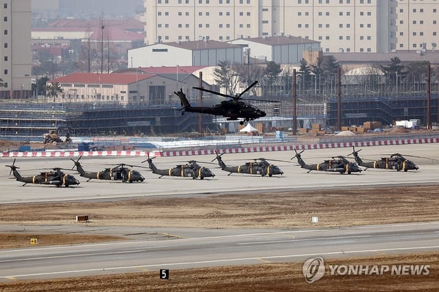 This photo, taken on March 10, 2025, shows Apache attack helicopters at Camp Humphreys, a U.S. military base in Pyeongtaek, some 65 kilometers south of Seoul. (Yonhap)
