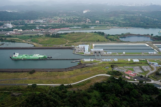 An aerial view shows a cargo vessel transits through the Agua Clara Locks at the Panama Canal, in Colon, Panama, February 1, 2025. REUTERS/Enea Lebrun/File Photo