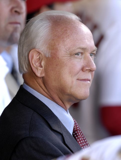 St. Louis Cardinals General Manager Walt Jocketty watches the opening day ceremonies before the Cardinals National League baseball game with the New York Mets in St. Louis, Missouri April 1, 2007. REUTERS/Tim Parker/File Photo