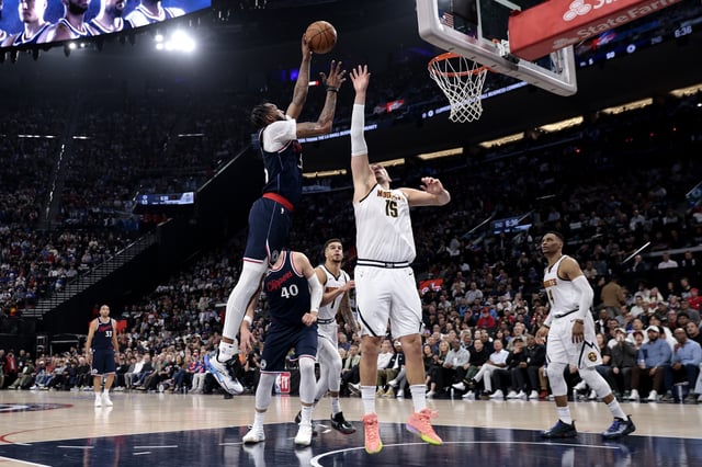 Derrick Jones Jr. #55 of the Los Angeles Clippers shoots the ball against Nikola Jokic #15 of the Denver Nuggets during the second quarter in Game Three of the Western Conference First Round NBA Playoffs at Intuit Dome on April 24, 2025 in Inglewood, California.