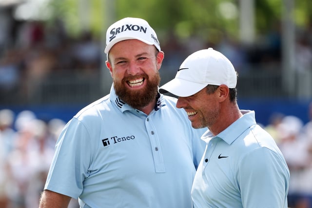 AVONDALE, LOUISIANA - APRIL 26: Rory McIlroy of Northern Ireland is congratulated by Shane Lowry of Ireland after his eagle on the 18th green on day three of the Zurich Classic of New Orleans on April 26, 2025 in Avondale, Louisiana.