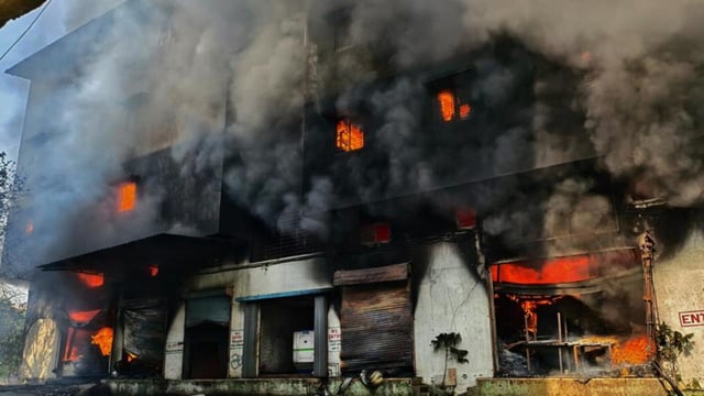 The Mumbai fire brigade received a call from residents of the eight-storey building at 2.39 am and reached the spot when the fire was still blazing. (Praful Gangurde /HT Photo)