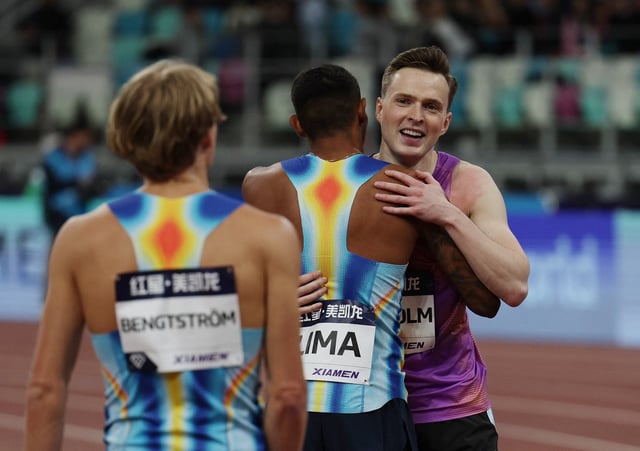 Athletics - Diamond League - Xiamen - Xiamen Egret Stadium, Xiamen, China - April 26, 2025 Norway's Karsten Warholm celebrates after setting a new world record in the men's 300m hurdles REUTERS/Go Nakamura