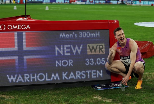 Athletics - Diamond League - Xiamen - Xiamen Egret Stadium, Xiamen, China - April 26, 2025 Norway's Karsten Warholm celebrates after setting a new world record in the men's 300m hurdles REUTERS/Go Nakamura