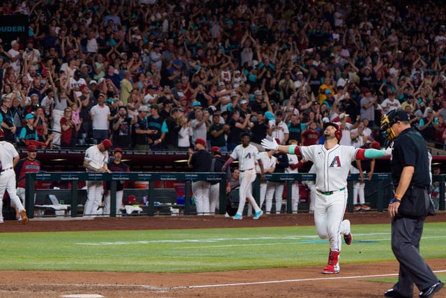 Arizona Diamondbacks third baseman Eugenio Suarez reacts after hitting his fourth home run against Atlanta.