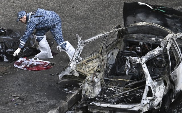 Emergency personnel work at the site of a car bomb attack that killed Lieutenant General Yaroslav Moskalik, a deputy head of the main operational department in the General Staff of the Russian armed forces, in Balashikha, outside Moscow, Russia on April 25, 2025. This image was provided to AP directly by a third party and could not be independently verified.
