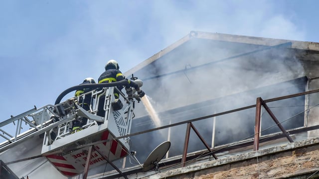 Firefighters try to douse the fire that broke out at Enforcement Directorate (ED) Office, Ballard Pier, in Mumbai on Sunday.