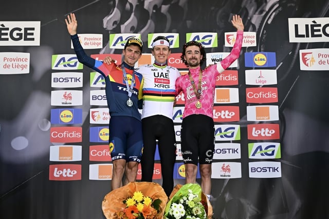 Liege-Bastogne-Liege winner Tadej Pogacar (C) was joined on the podium by second-placed Giulio Ciccone (L) and third-placed Ben Healy