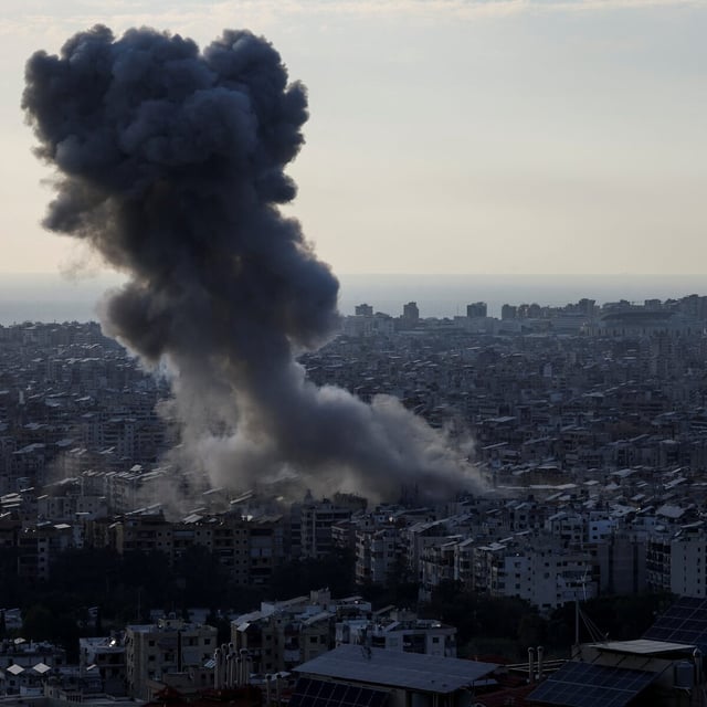 Smoke billows over Beirut's southern suburbs, following an Israeli strike after issuing an evacuation warning for the area, as seen from Baabda, Lebanon, April 27, 2025. REUTERS/Mohamed Azakir     TPX IMAGES OF THE DAY