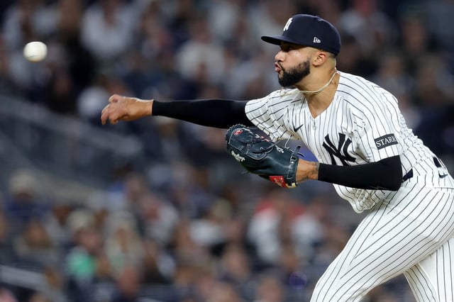 Apr 25, 2025; Bronx, New York, USA; New York Yankees relief pitcher Devin Williams (38) pitches against the Toronto Blue Jays during the ninth inning at Yankee Stadium. Mandatory Credit: Brad Penner-Imagn Images/File Photo