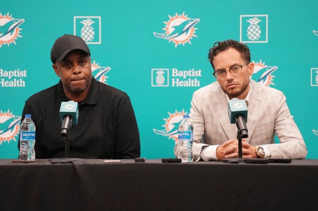 Miami Dolphins general manager Chris Grier and coach Mike McDaniel filled primary needs of draft with two big linemen, but left the secondary in need of help. (AP Photo/Jim Rassol)