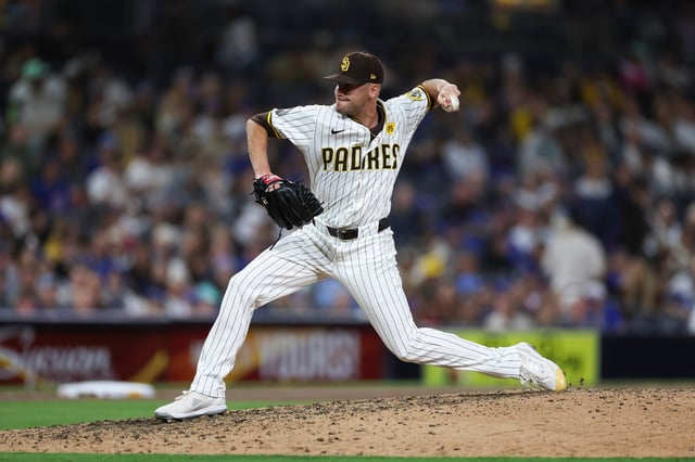 SAN DIEGO, CALIFORNIA – APRIL 9: Tom Cosgrove #59 of the San Diego Padres throws a pitch during the ninth inning against the Chicago Cubs at PETCO Park on April 9, 2024 in San Diego, California. (Photo by Brandon Sloter/Getty Images)