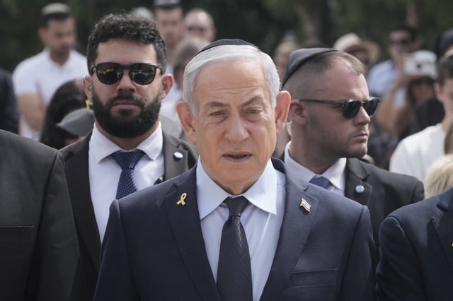 Israeli Prime Minister Benjamin Netanyahu attends a ceremony marking the annual Holocaust Remembrance Day, at Yad Vashem Holocaust Memorial in Jerusalem, April 24, 2025. Maya Alleruzzo/Pool via REUTERS