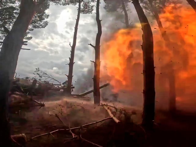 In this photo taken from video distributed by Russian Defense Ministry Press Service on Sunday, April 27, 2025, a Russian Army 152mm howitzer Giatsint-B fires towards Ukrainian positions in Kherson, Ukraine. (Russian Defense Ministry Press Service via AP)