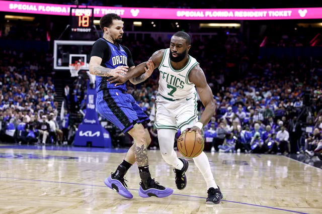 Jaylen Brown #7 of the Boston Celtics is defended by Cole Anthony #50 of the Orlando Magic during the first half in Game 3 of the first round of the 2025 NBA Playoffs at the Kia Center on April 25, 2025 in Orlando, Florida. The Magic defeated the Celtics 95 to 93.