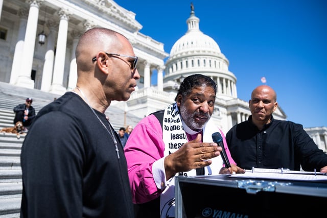 From left, House Minority Leader Hakeem Jeffries, D-N.Y., Rev. Dr. William Barber, and Sen. Cory Booker, D-N.J., on the House steps of the U.S. Capitol on April 27, 2025.