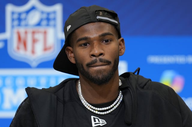 Shedeur Sanders speaks during a press conference during the NFL football scouting combine on Feb. 28, 2025, in Indianapolis, Ind. 