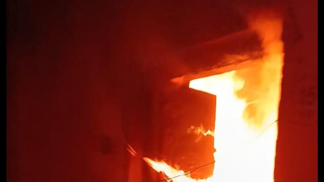 Flames coming out of room number 15 on ground floor at the Directorate of Secondary Education in Prayagraj on April 27. (HT photo)