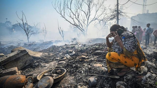 A resident at the fire site. (Sanchit Khanna/HT Photo)