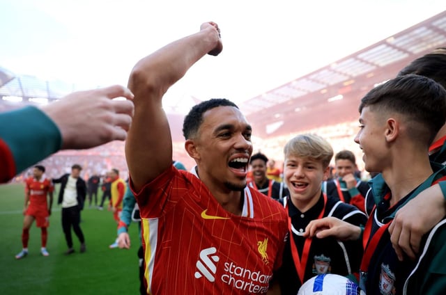 Trent Alexander-Arnold celebrates Liverpool winning the Premier League title (Photo: Getty)