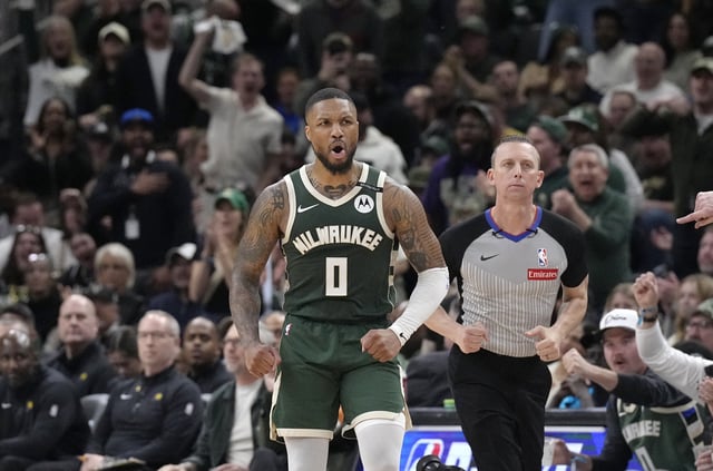 Apr 25, 2025; Milwaukee, Wisconsin, USA; Milwaukee Bucks guard Damian Lillard (0) reacts after making a basket against the Indiana Pacers in the second half during game three of first round for the 2024 NBA Playoffs at Fiserv Forum. Mandatory Credit: Michael McLoone-Imagn Images/File Photo