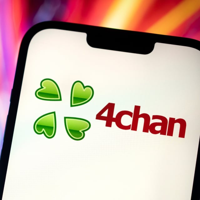 The 4Chan website logo on a mobile phone screen.